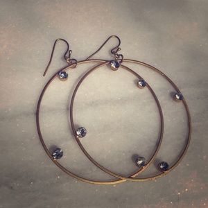 Hoop and diamond gold fashion earrings.